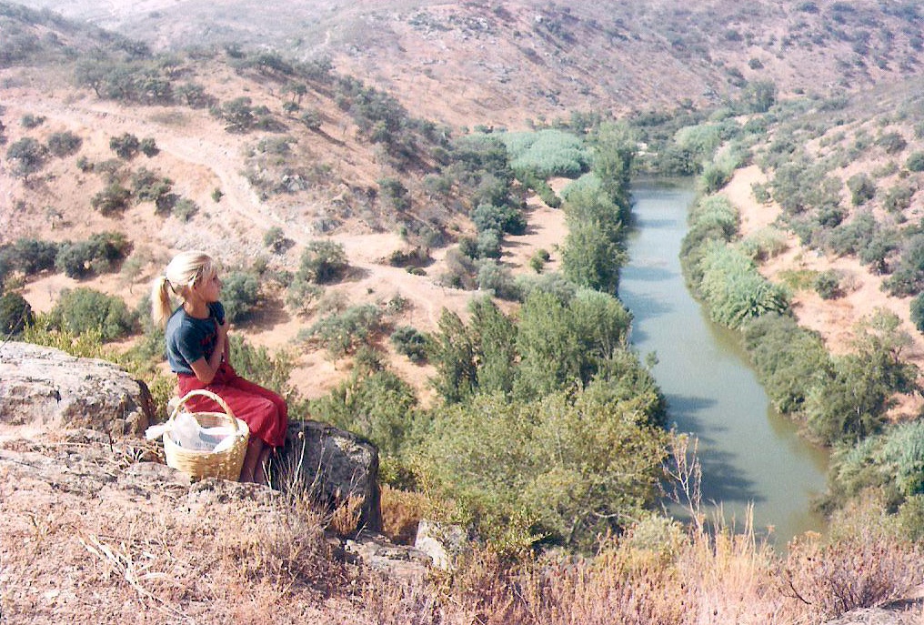 A figure on a rocky bluff above the Rio Guadiana.